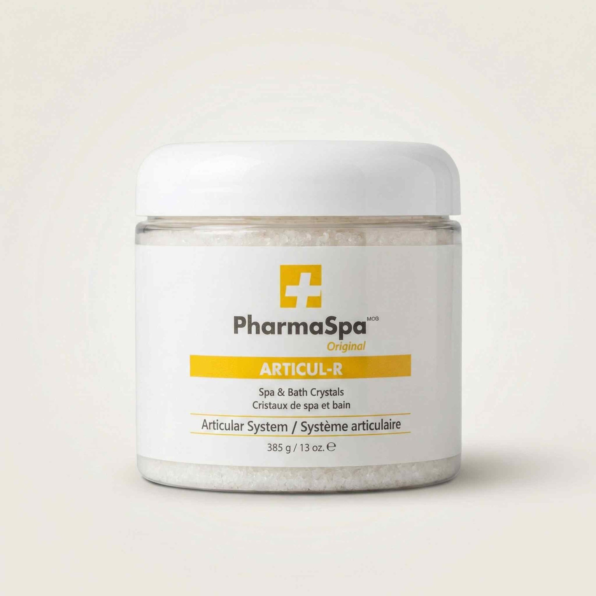 White jar of PharmaSpa Articul-R spa crystals with yellow label for joint and articular relief