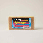 The Spa Sponge tan rectangular cleaning sponge in colourful branded packaging on white background