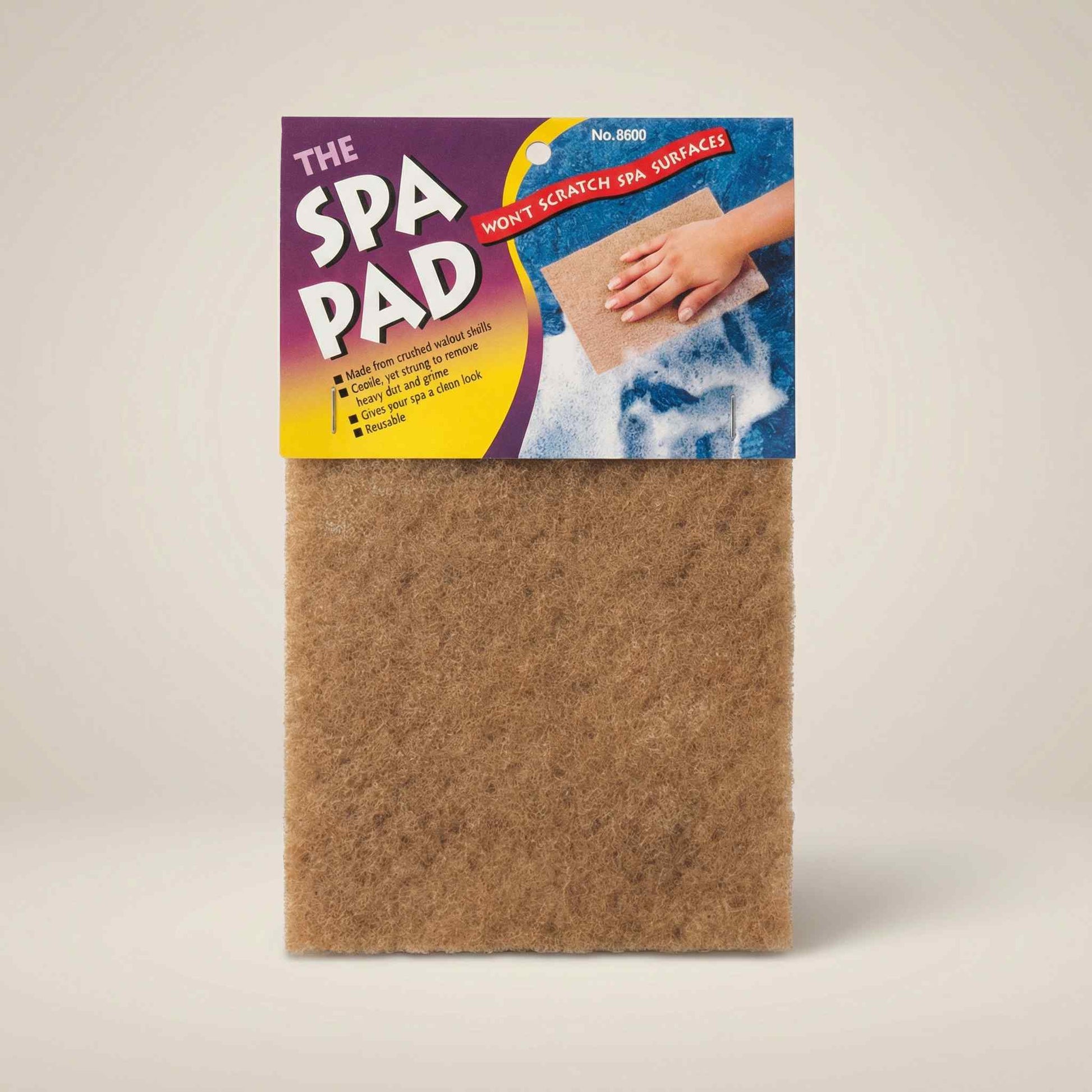 The Spa Pad brown rectangular hot tub cleaning pad in blue branded packaging