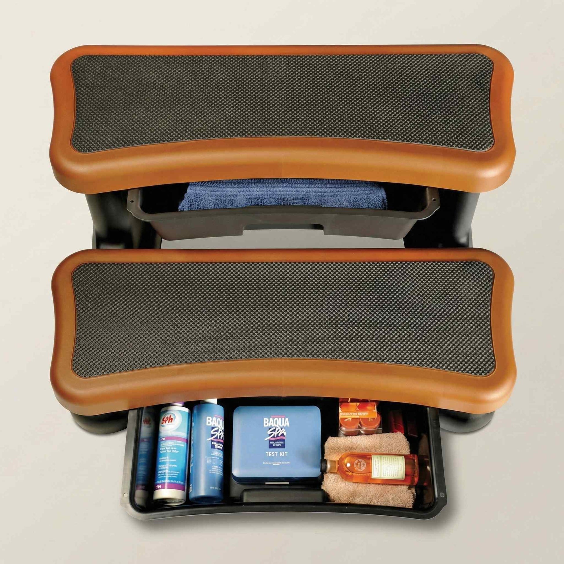 SmartDrawer for SmartStep open showing organized interior with spa chemicals and accessories