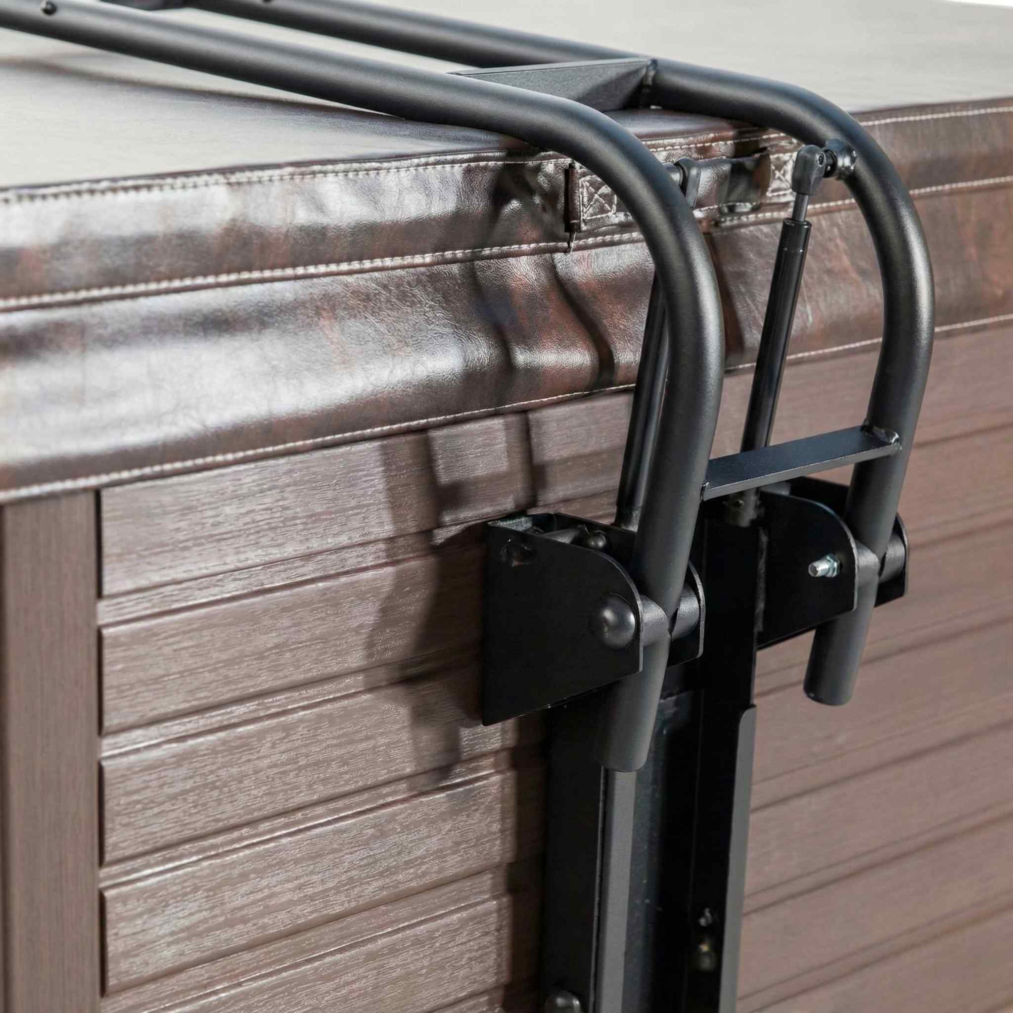 CoverMate Freestyle cover lifter fully assembled with the arm extended holding a spa cover