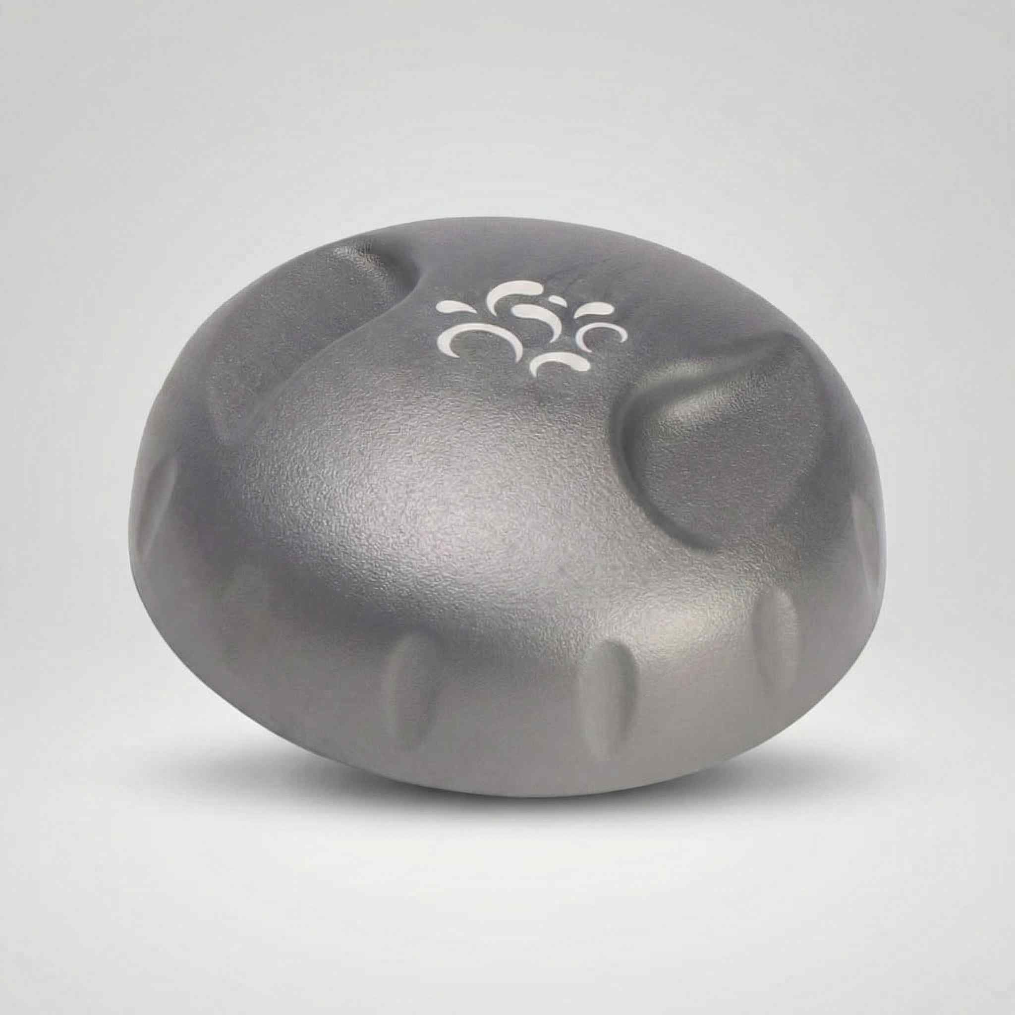 Silver-grey rounded Jacuzzi waterfall control knob with three decorative swirl cutouts