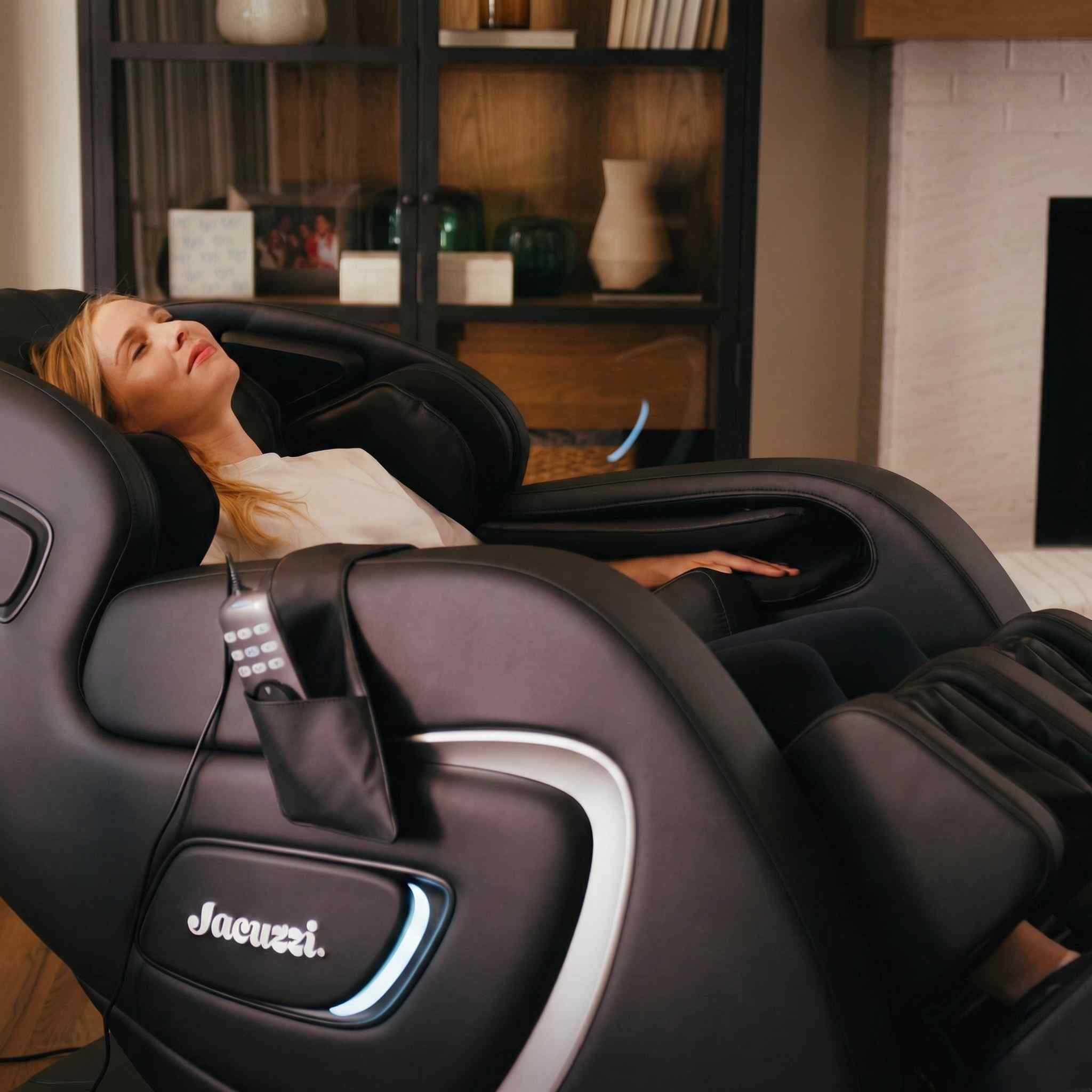 Woman relaxing in a Jacuzzi massage chair in reclined position in a luxury modern living room
