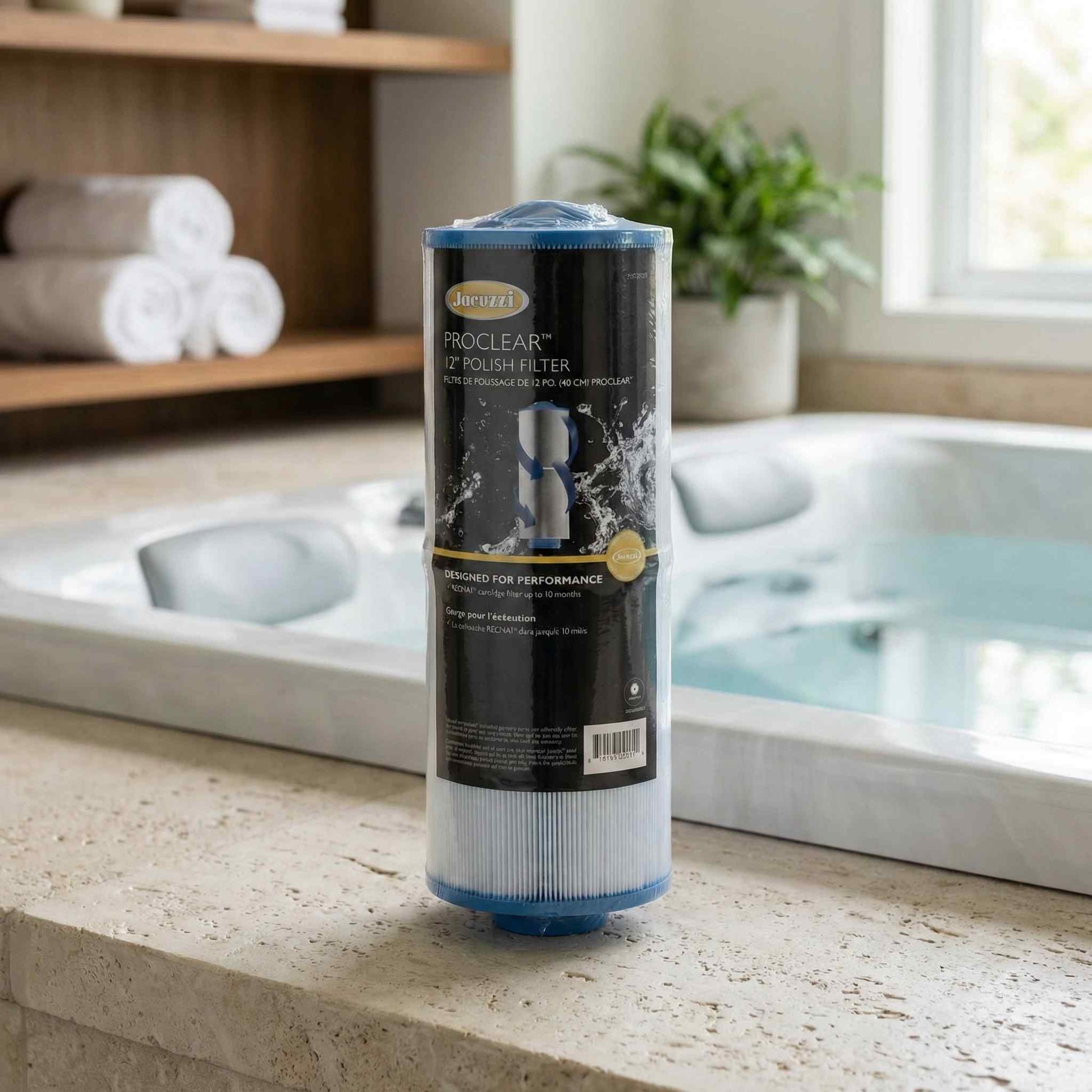 Jacuzzi 35 sq ft filter displayed beside a hot tub on a stone ledge with towels