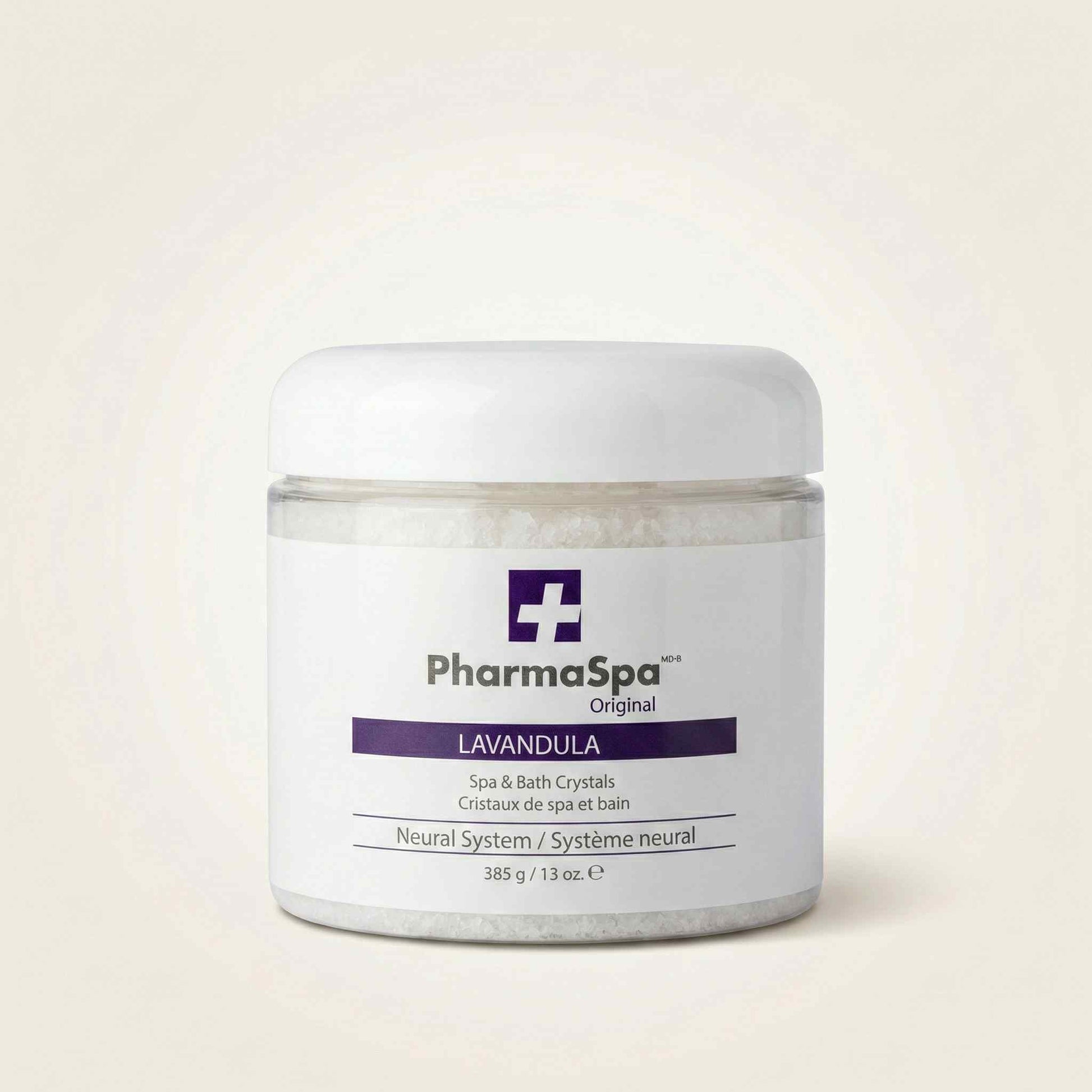 White jar of PharmaSpa Lavandula spa crystals with purple label for relaxation